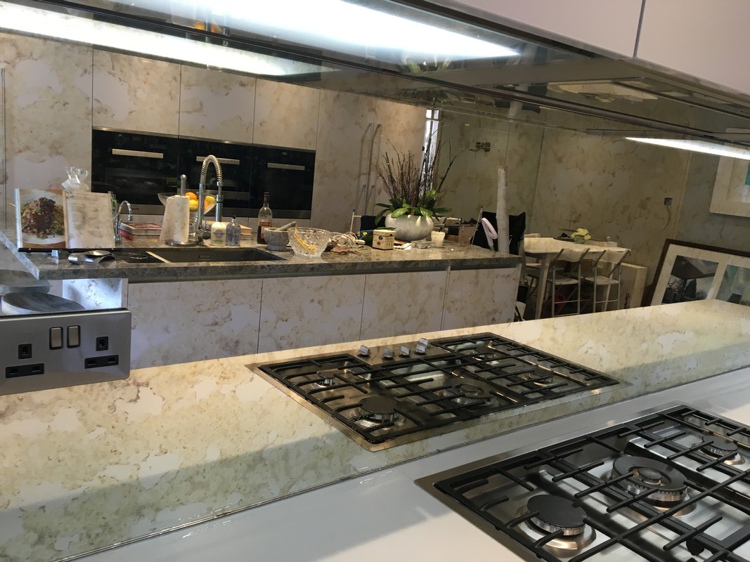 Mirror glass splashback in Aldgate luxury kitchen